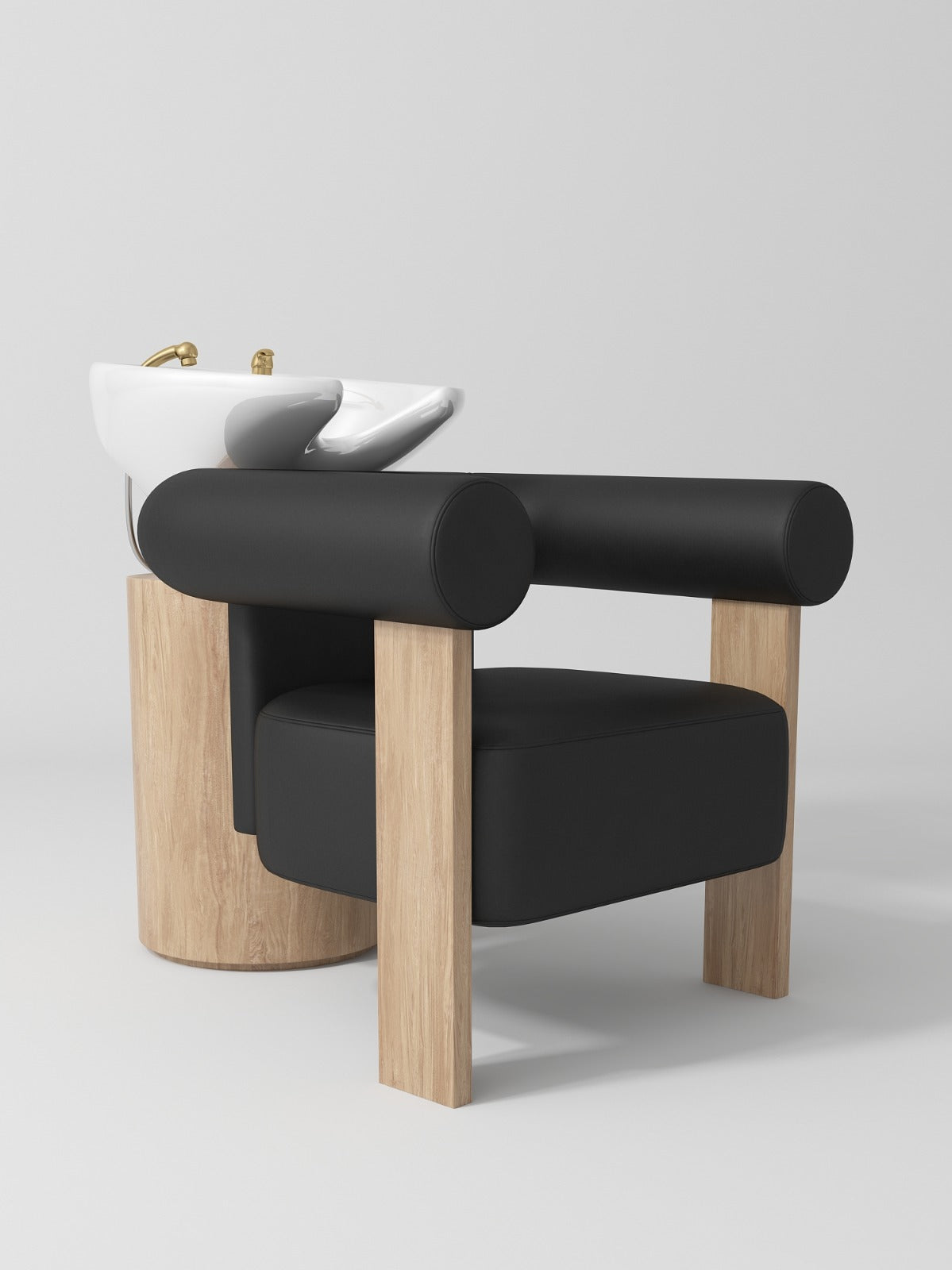 white hair basin with black leather chair and wooden legs