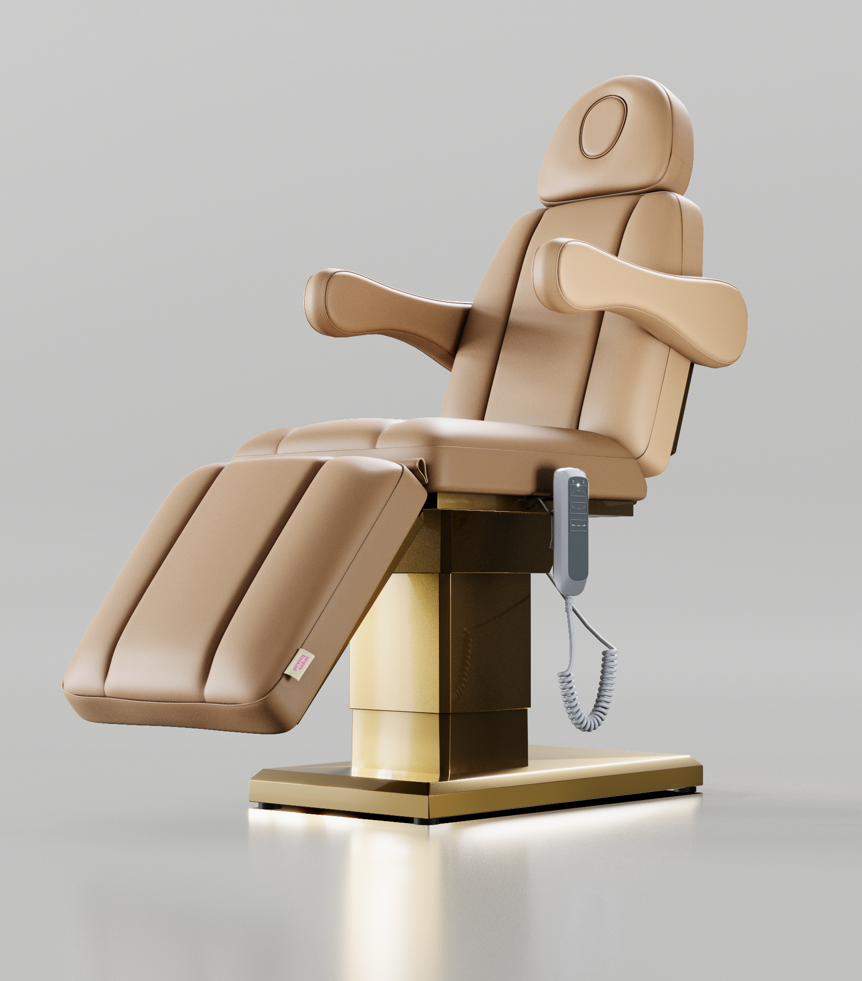 Brown electric bed with gold base and hand control