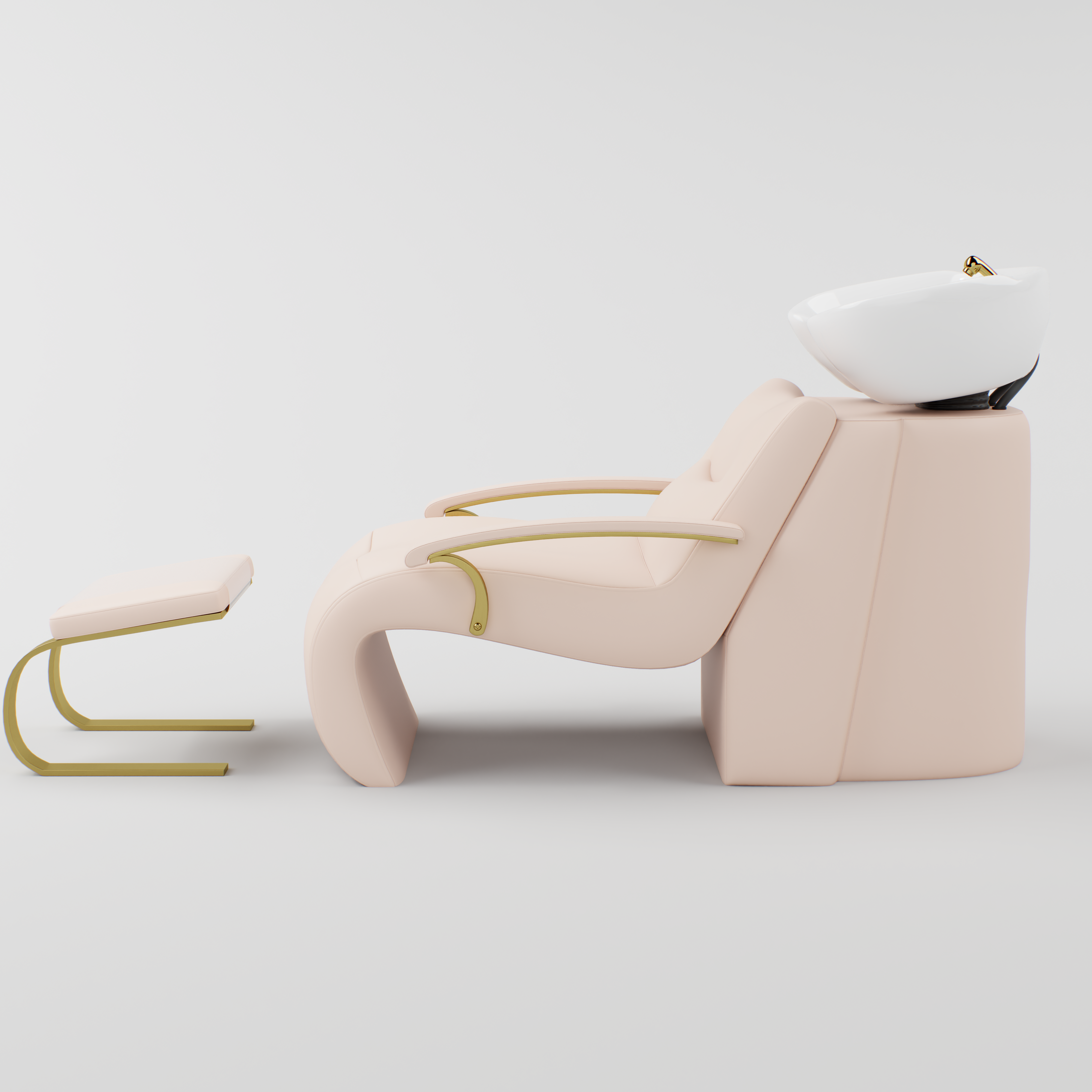 Pink and gold shampoo chair with footrest and gold accessories