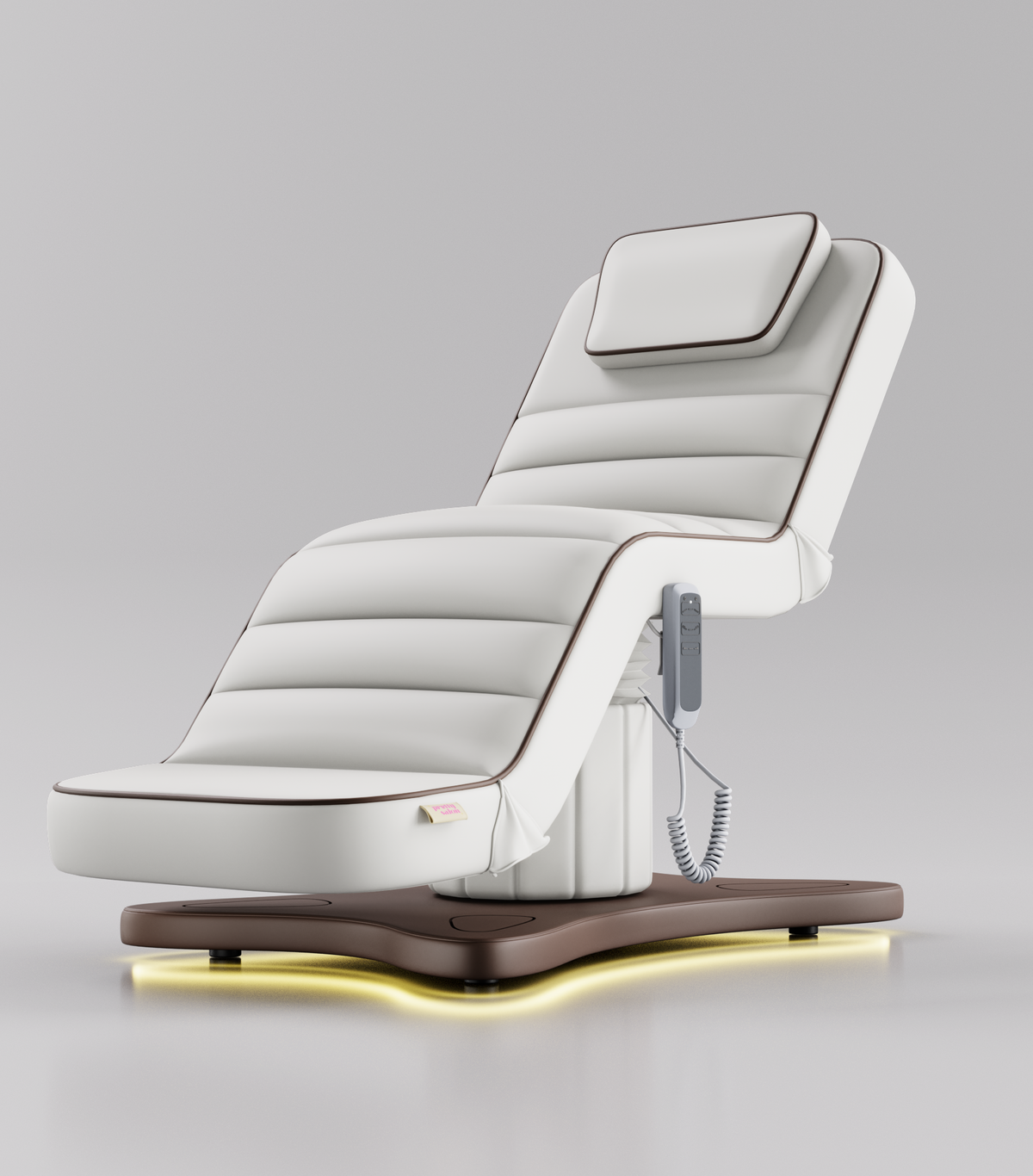 White electric beauty bed with brown base and brown piping for beauty treatments