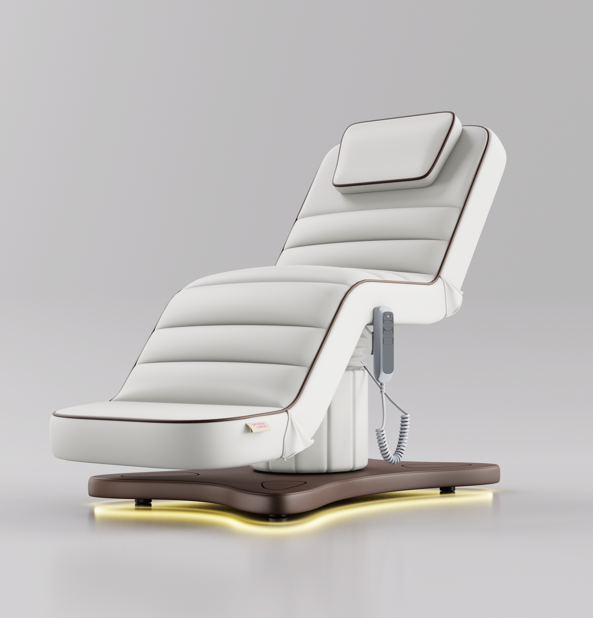 White electric beauty bed with brown base and brown piping for beauty treatments
