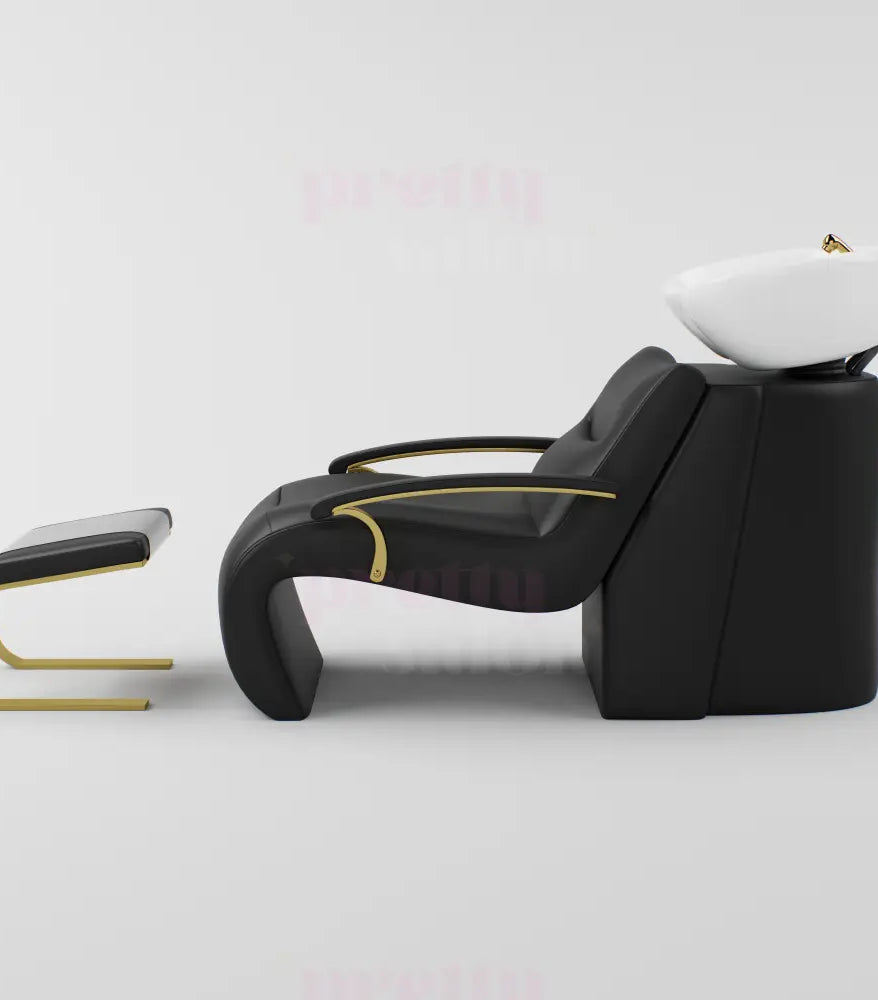 Black leather hair chair with basin and footrest