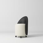 cream and black leather stool on wheels
