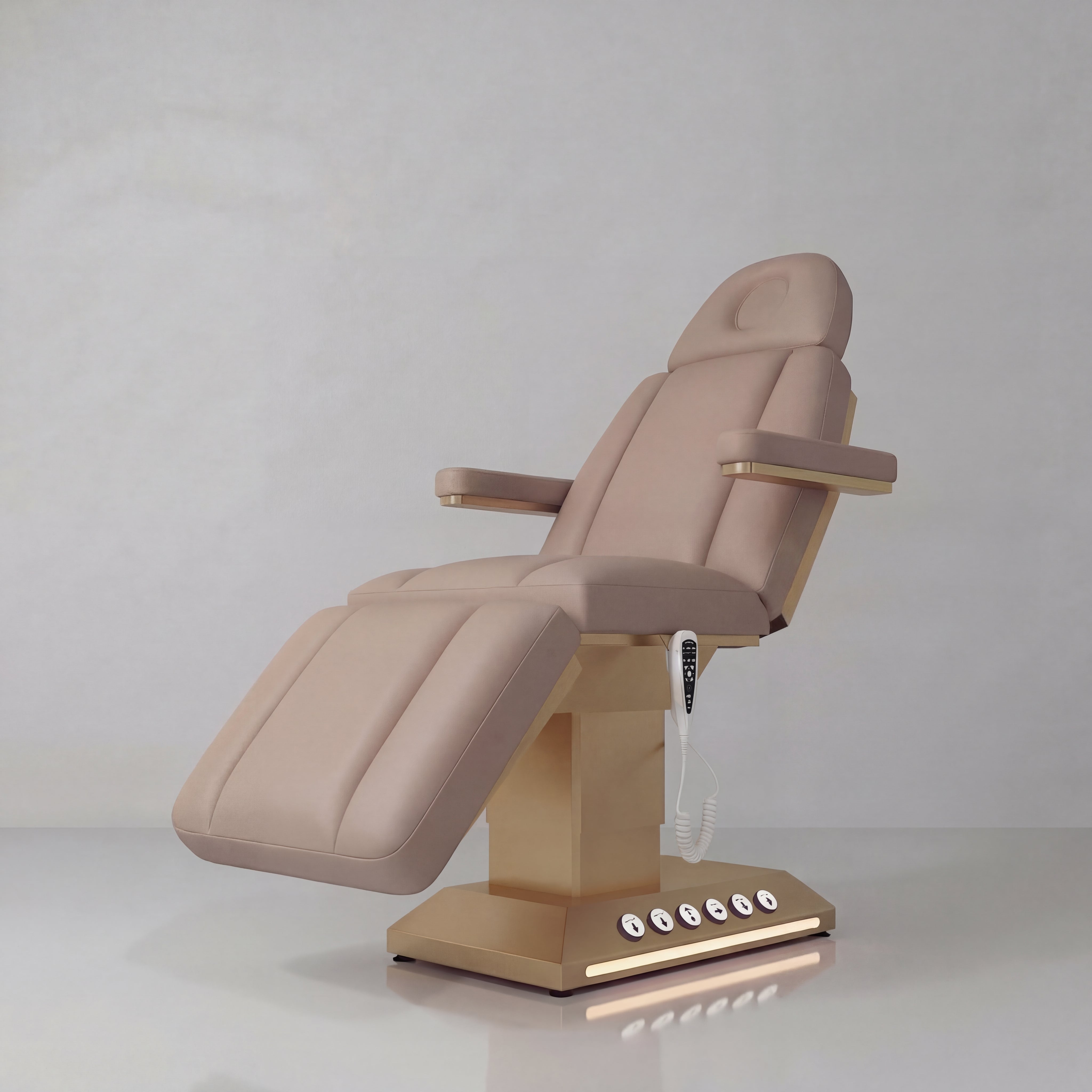 Luxury Electric beauty bed with foot control in a soft brown.