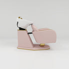 Pink side view of backwash unit