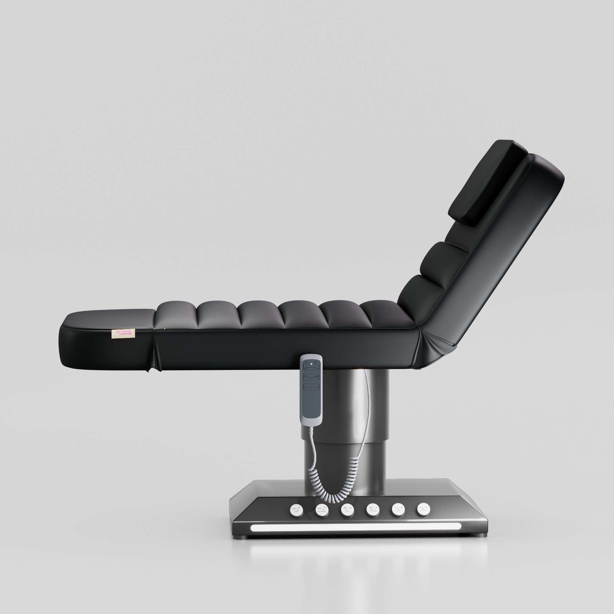 Black adjustable beauty bed with chrome black base and integrated foot control system