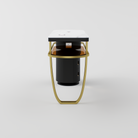 Nail station showing integrated USB and wireless charger on the sintered stone worktop.