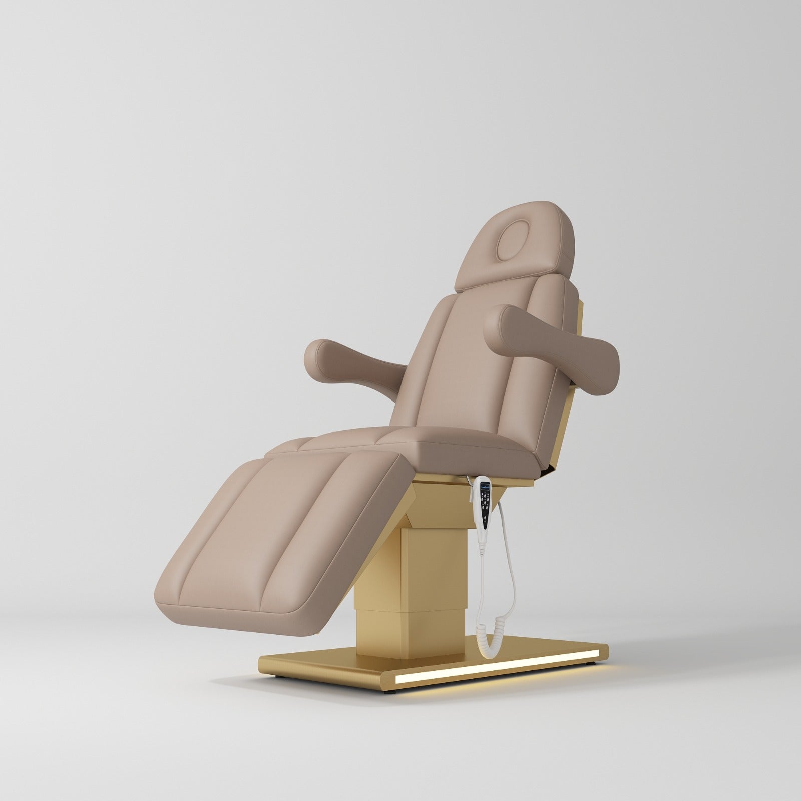 Brown electric bed with gold base and hand control 