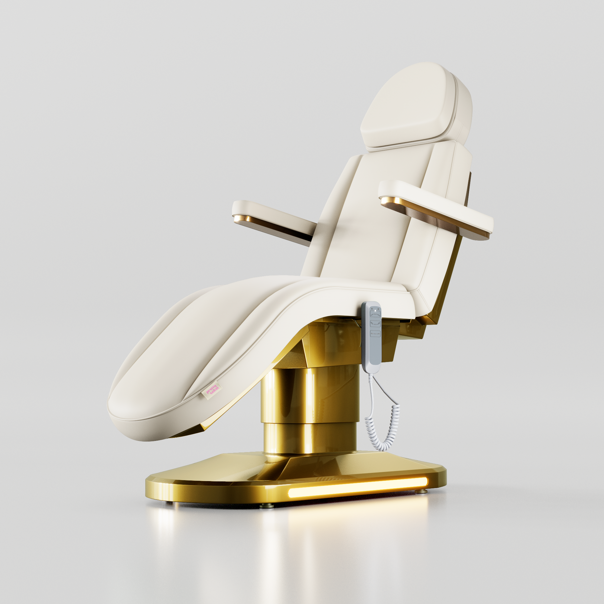 Cream electric beauty treatment bed with soft curved shape and gold base