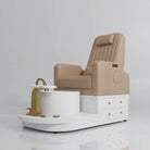 Pedicure station with gold taps, pillow, reclining backrest and massage in light brown