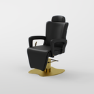 Black reclining beauty chair with gold base and adjustable in height