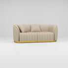 Nude luxury leather sofa with gold trim