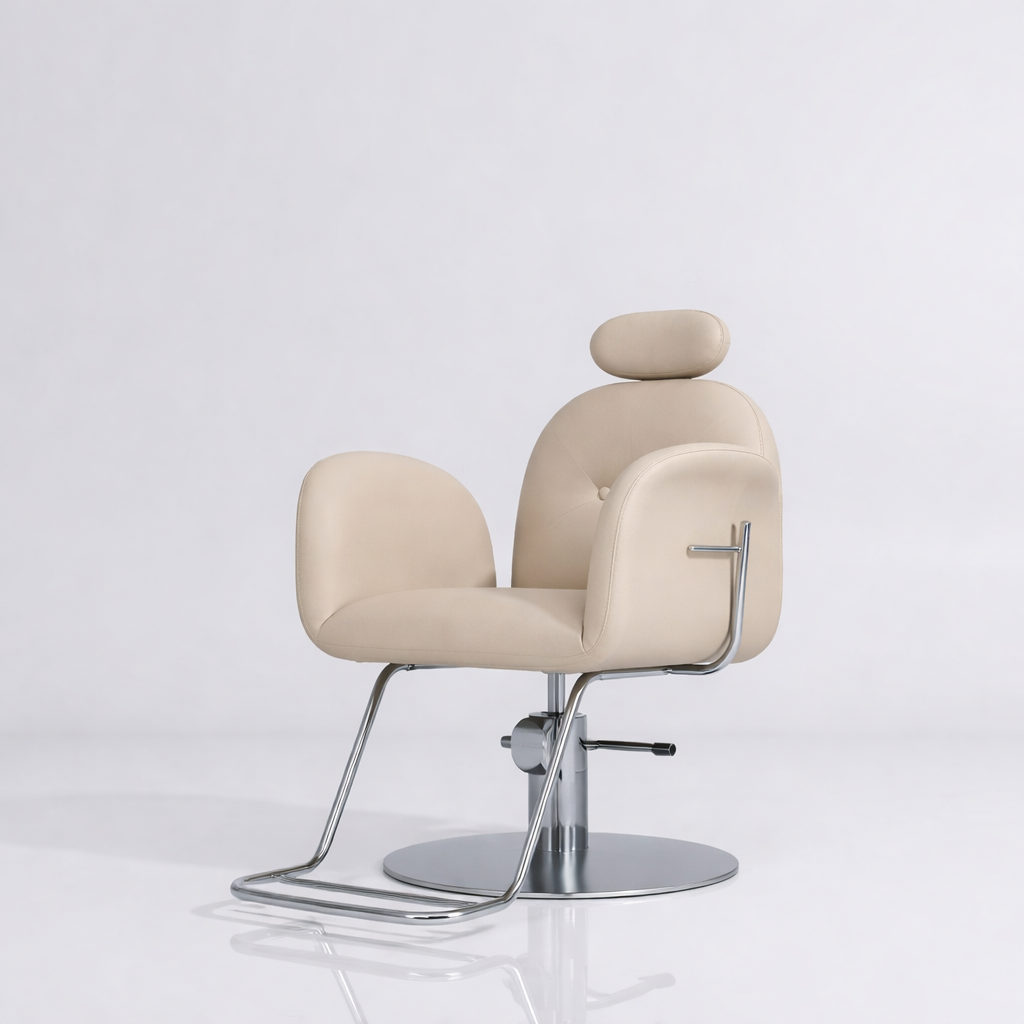 Nude leather modern styling chair with circle silver base and foot rest 