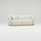 Cream leather salon sofa with gold trim
