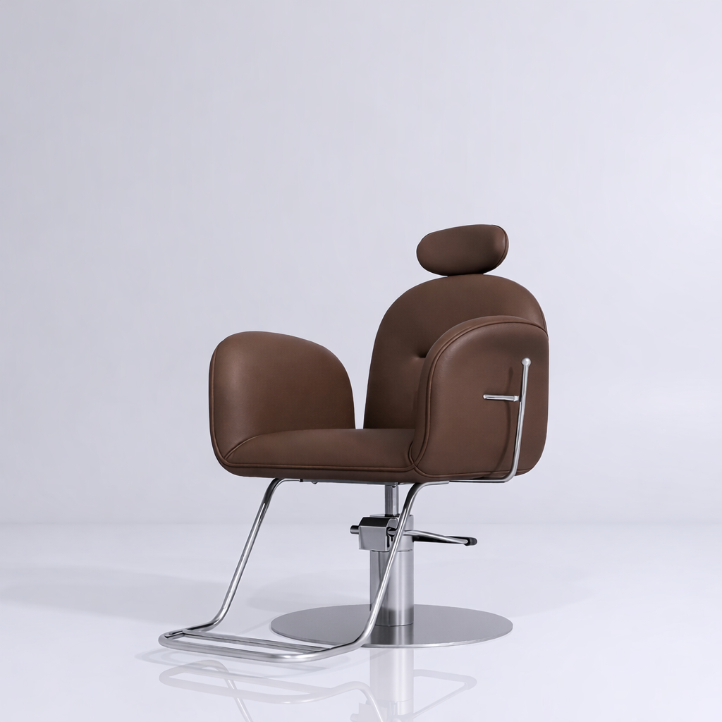 styling chair in brown and silver with footrest and pump