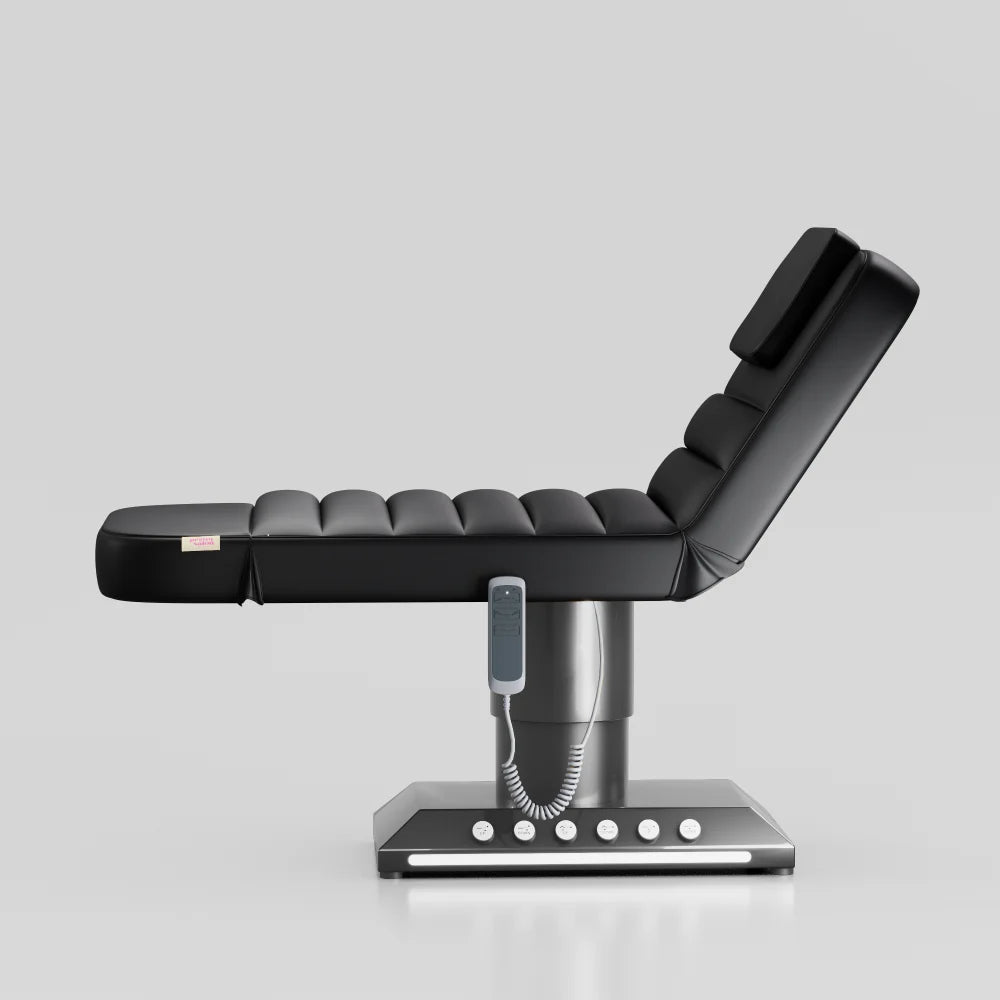 Black adjustable beauty bed with chrome black base and integrated foot control system