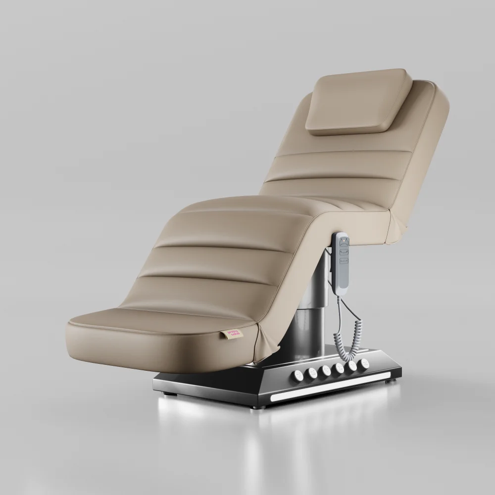 Nude adjustable beauty bed with chrome black base and foot pedal controls for salons and clinics