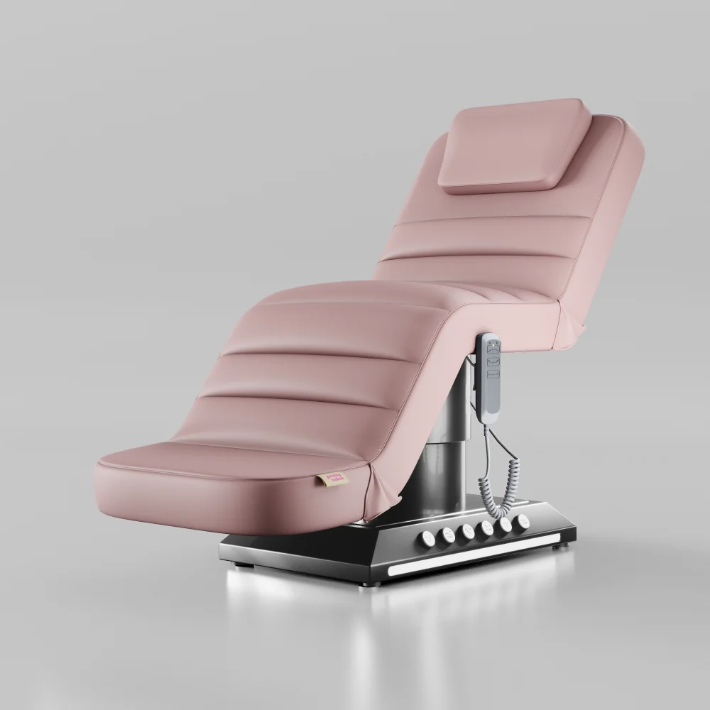 Pink electric treatment bed with foot control and chrome black base for beauty and aesthetic treatments