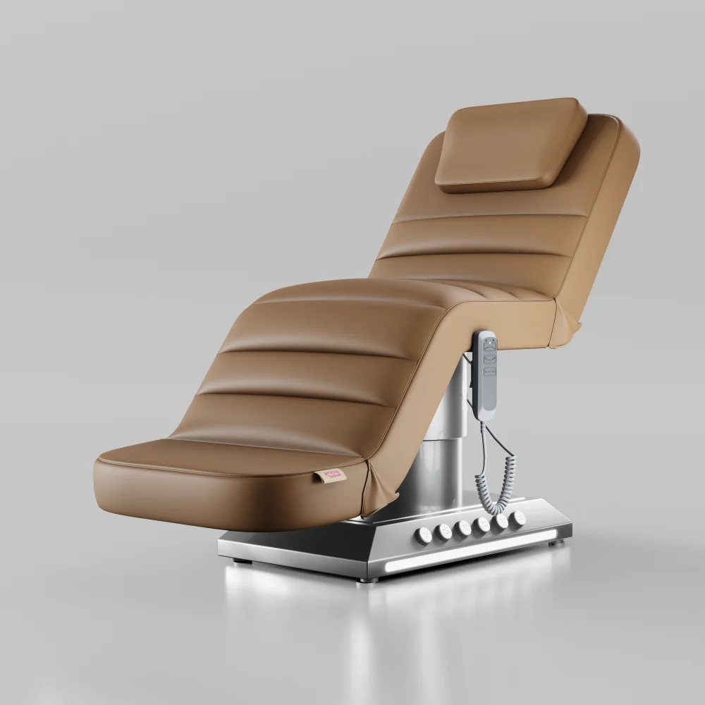 Soft brown electric beauty bed with foot control, adjustable backrest and silver base