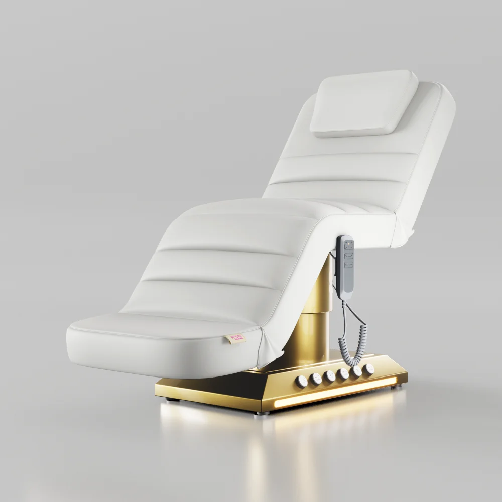 White electric beauty bed with adjustable positions, foot control and gold base