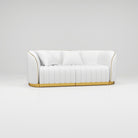 white leather salon sofa with gold trim